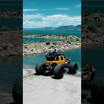 Security cam footage of monster truck crashing into lake..