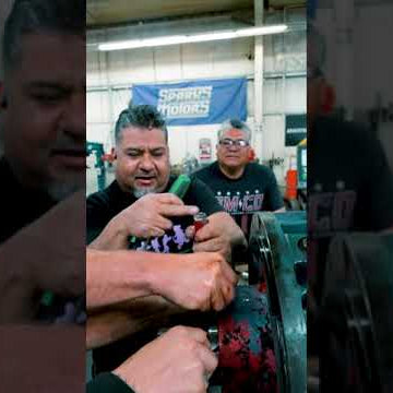How many mechanics does it take to screw in a light bulb?